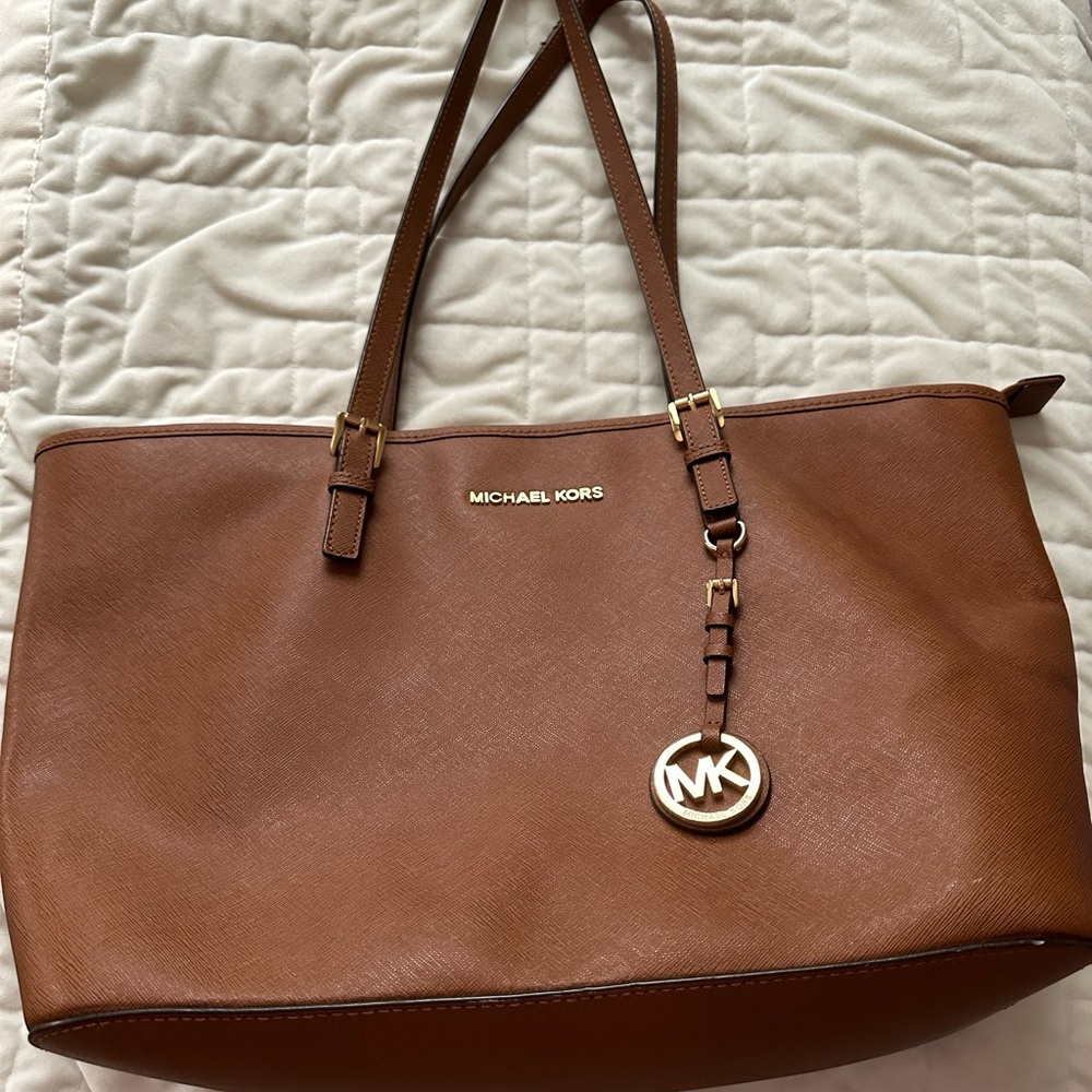 Michael Kors brown bag.